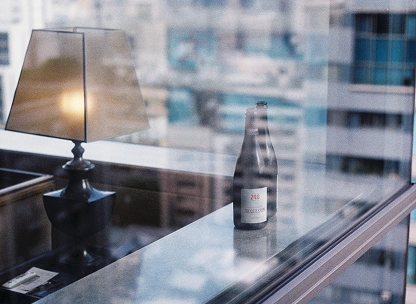 Champagne bottles seen through the window of a Taiwan hotel room
